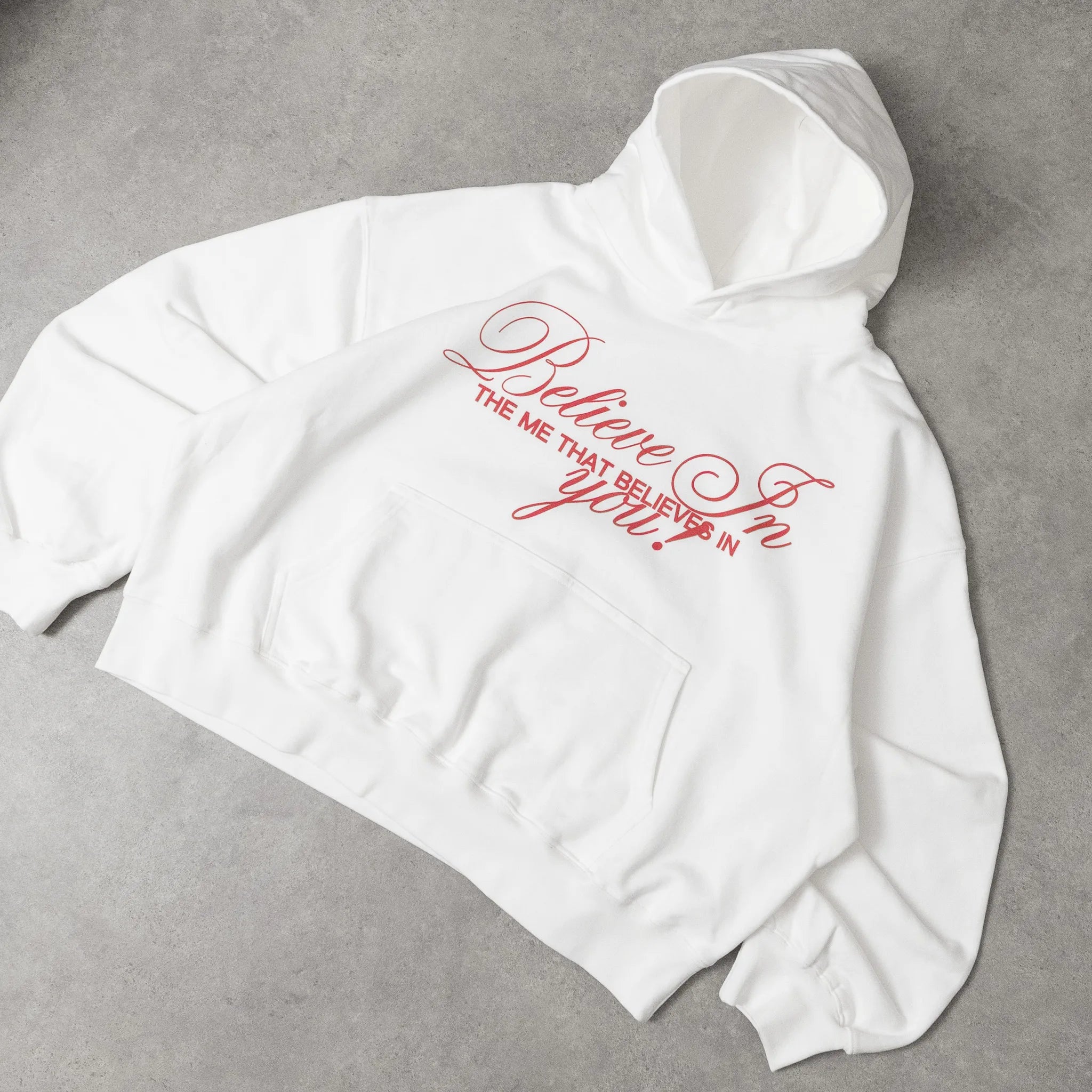 White hoodie with red text on a gray background option1_essential