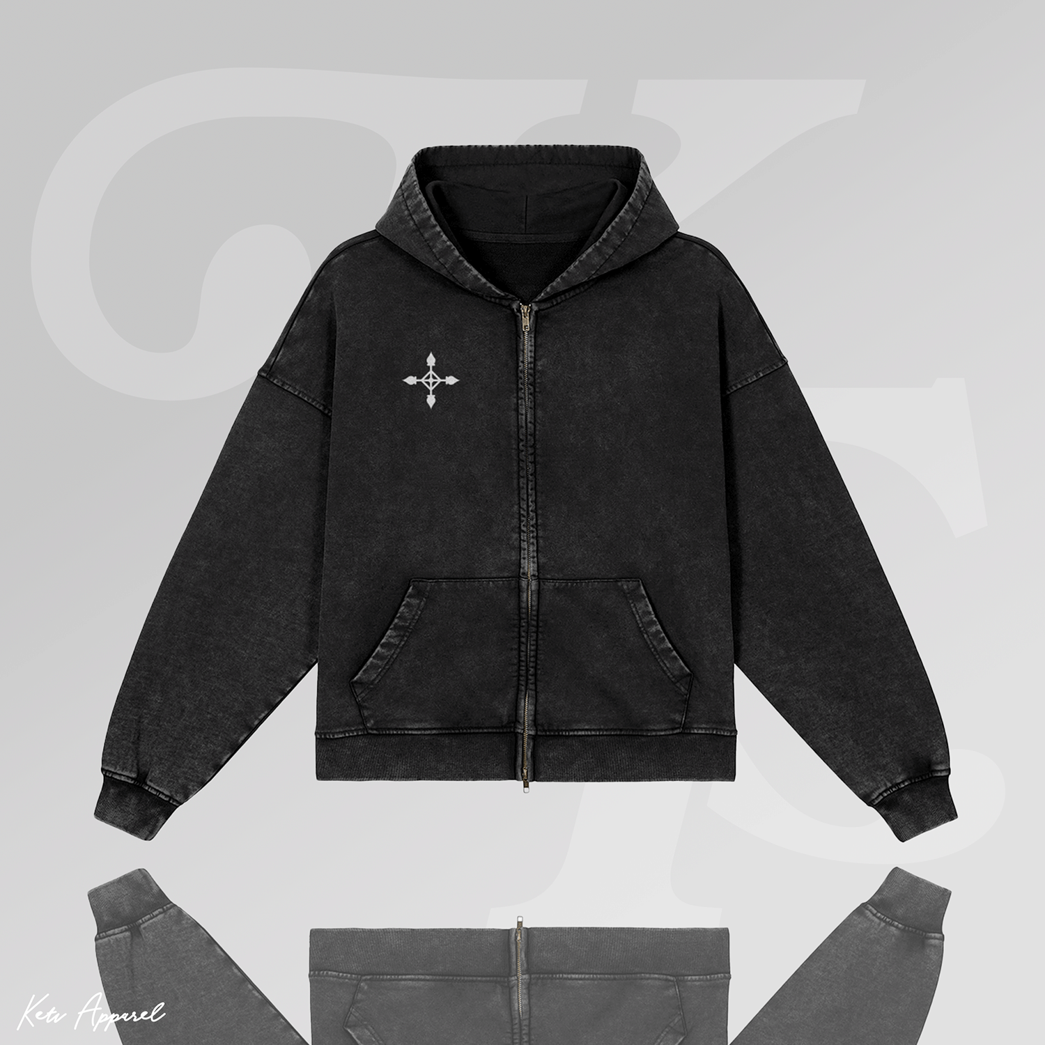 Black hoodie with a logo on a light gray background